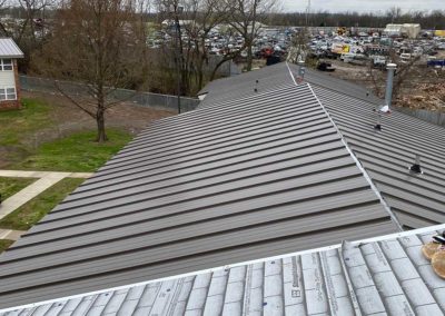 New metal shingles installed by P-G Roofing and Construction