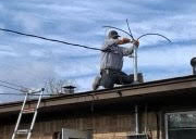 P-G Roofing and Construction electrician installing electrical wires